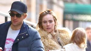 Suki Waterhouse and Robert Pattinson are pictured with their daughter as they enjoy a family coff…