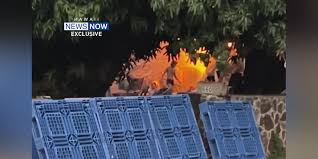 EXCLUSIVE: Video shows Aina Haina man moving rubble as fire burns nearby | Blaze extinguished at …