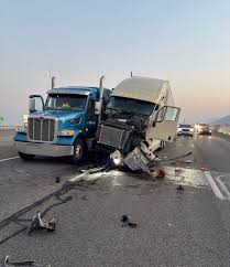 Friday morning traffic resumes after I-15 crash in Ogden | Crash involving two semi-trucks, car c…